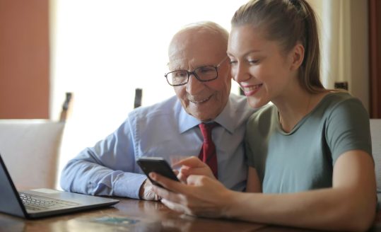 Dad and Daugher discussing Always Vigil's solutions